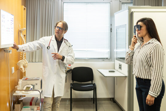 Doctor conducts ophthalmological exam in medical clinic