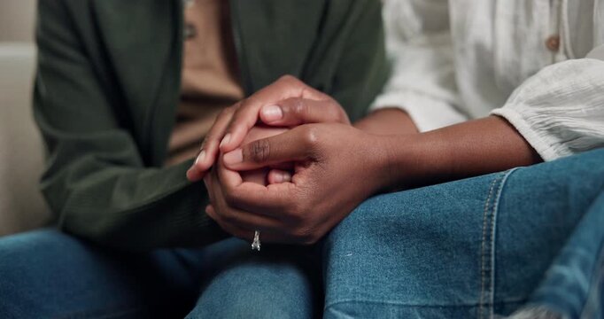 Mom, child and holding hands with comfort in home on sofa for bonding, understanding or listening. Mother, kid or empathy with son on couch for sympathy, trust or emotional support together in house