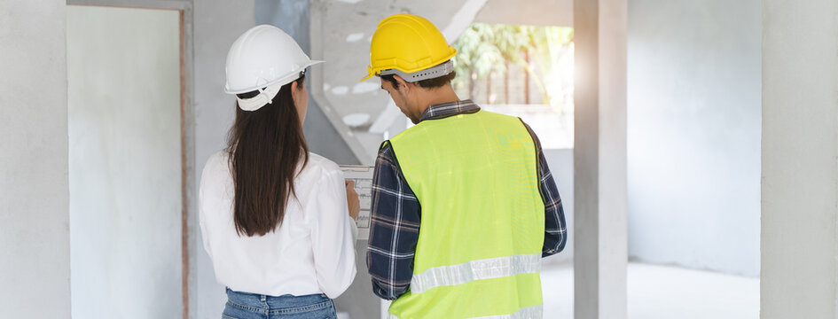 Client and Contractor discussing plan to renovation house