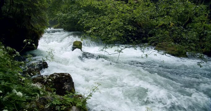 Mountain river near Golling Waterfall. Salzburg Alps in Austria