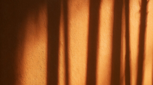 Warm Sunlight and Shadow Patterns on Textured Wall Surface