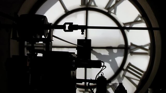 Silhouette of Technician Lubricating Clockwork Mechanism in Tower - 4K