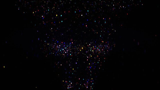 Vibrant multicolored glitter particle vortex sparkles and rotates against a deep black backdrop, loopable festive and magical atmosphere