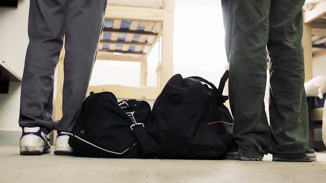 Two Students Arriving at Boarding School Dormitory Room Carrying Bags, Low Angle View - 4K