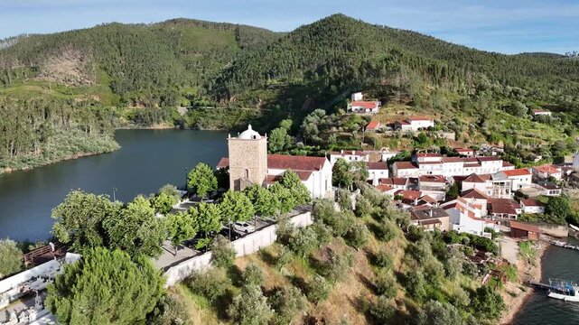 Close Drone Orbit Around the Templar Tower in Dornes, Portugal