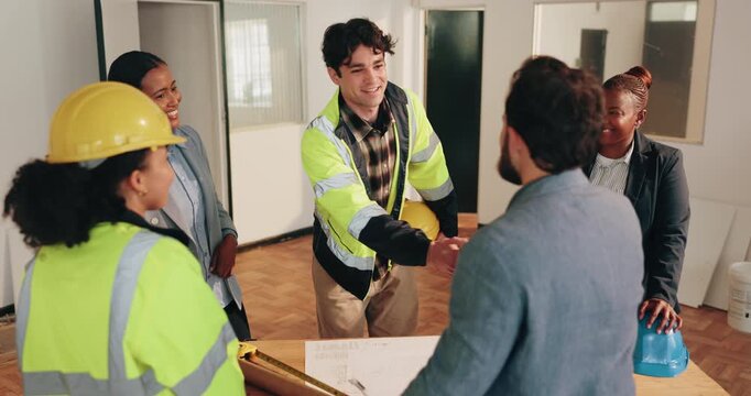Site, blueprint or team handshake in construction for phase approval, renovation or inspection pass. Schematic, happy people or inspector shaking hands for compliance, project clearance or remodeling