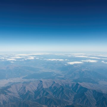 Expansive vista from a soaring altitude demonstrating the absolute top limit of view and the maximum spatial extent ,scope ,boundless ,achievement