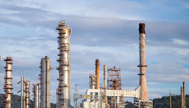Oil and Gas Industrial zone,The equipment of oil refining,Close-up of industrial pipelines of an oil-refinery plant,Detail of oil pipeline with valves in large oil refinery.