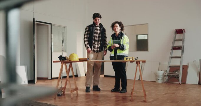Site, tablet or people handshake in construction for inspection pass, renovation approval or happy. Tech, foreman or inspector shaking hands for phase completion, code compliance or project clearance