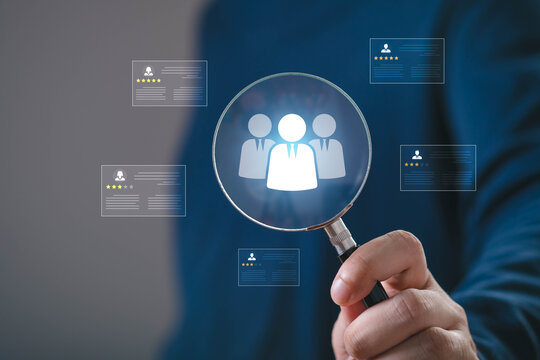 Magnifying glass highlighting talent recruitment with candidate profile ratings, symbolizing hiring, human resources, employee selection, recruitment process, workforce management, talent acquisition.