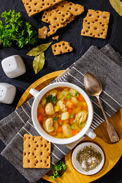 Clear American chicken meatball soup with veggies