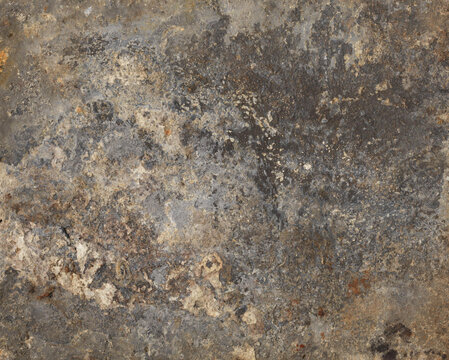 Weathered raw stone and slate texture with dark grey, rusty brown, and earthy mineral stains.