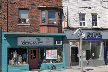 Fototapeta premium exterior, wide view of Knit-O-Matic, a knit shop, located at 1382 Bathurst St, Toronto (next door: Kiyo Japanese Cuisine)