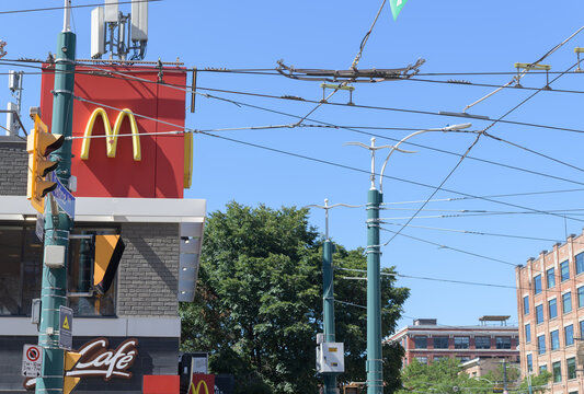 exterior building and sign outside McDonald's, a fast food restaurant chain, located here at 160 Spadina Av (northwest corner of Queen St), Toronto