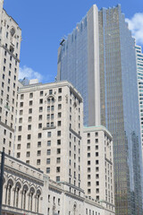 Fototapeta premium view of the Fairmont Royal York hotel (central block with projecting wings) and Royal Bank Plaza South Tower on Front St W, Toronto