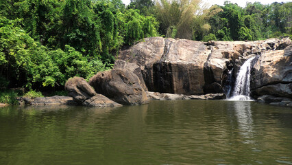 Fototapeta premium Beautiful rocky landscape adjacent to the Ripple Waterfalls near Munnar, Idukki, Kerala, India