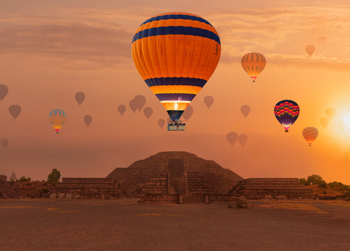 Hot air balloon flying over Teotihuacan pyramids complex located in Mexican Highlands and Mexico Valley close to Mexico City. Mexico