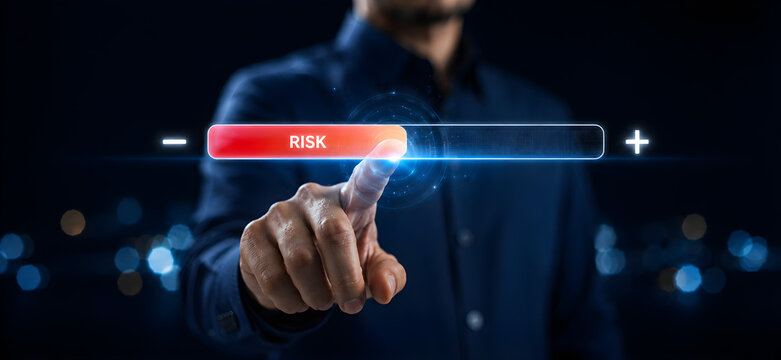 Businessman hand sliding horizontal risk meter bar to adjust risk management control level

