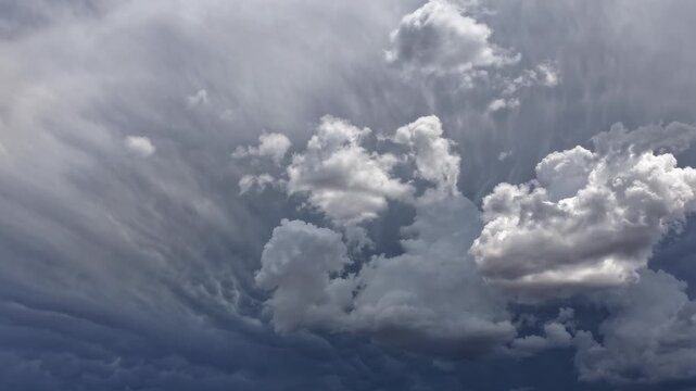 Aerial view of dramatic monsoon storm clouds with morphing textures and intense lighting in Los Alamos, New Mexico, United States.
