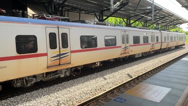 Close up of white arches at old Kuala Lumpur KTM train station, historical landmark.