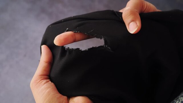 How to fix a hole in black clothing