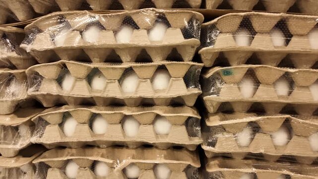 Egg cartons stacked in a store