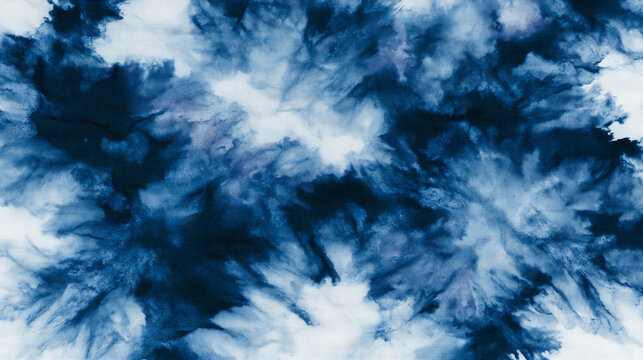 Abstract indigo blue tie dye watercolor pattern on white fabric