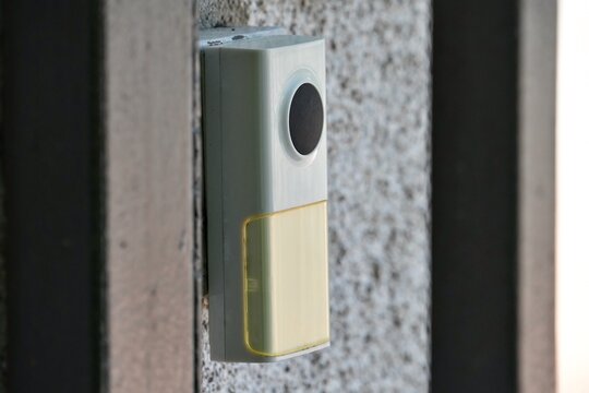 close up of a doorbell. One button doorbell. Basic doorbell.