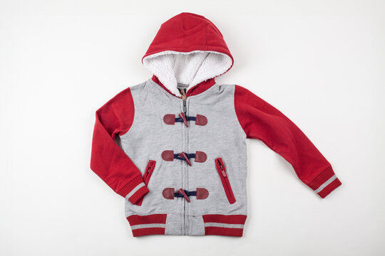 Red and Grey Child's Fleece-Lined Zip-Up Hoodie with Sherpa Hood. Cozy Winter Jacket on White Background.