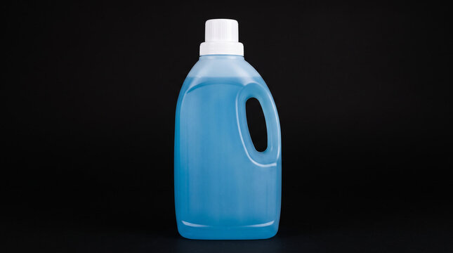 Blue plastic laundry detergent bottle with white cap.