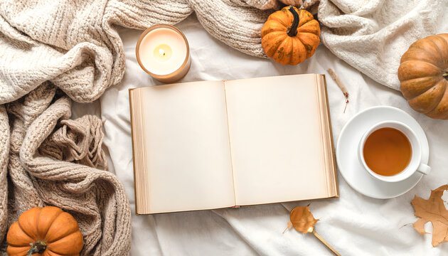 Reading nook flatlay with open book and candle creating calm and relaxing autumn mood generative AI