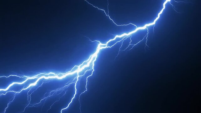 A powerful lightning bolt strikes across a dark blue night sky during a severe.