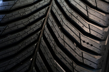 New car tires with a new design is presented at an auto parts fair, expose for selling . Photographed in natural light  © Silviu