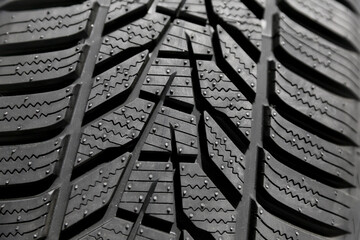 New car tires with a new design is presented at an auto parts fair, expose for selling . Photographed in natural light  © Silviu