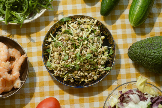 Ingredients for summer salad with shrimps, herbs and vegetables. Heathy dinner. 