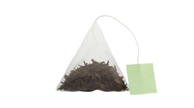 Pyramid tea bag with herbal leaves and green label on a transparent background PNG file