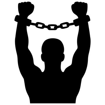 Silhouette of a man with handcuffed hands