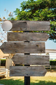 Blank Wooden Directional Arrow Signs on Post Outdoor Garden