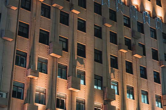 Art Deco Building Facade Illuminated at Night Urban Architecture Detail