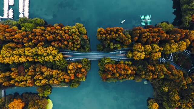  Top‑down aerial drone view of complex multi‑layer highway interchange in modern chinese city, busy urban traffic network 4K
