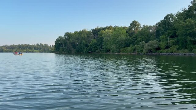 calm water and green trees at marsh creek lake, Chester county, Pennsylvania