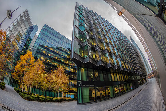 LONDON, ENGLAND - NOVEMBER 27, 2017: Modern and spectacular office buildings on More London Riversid, and The Shard building in bachground.