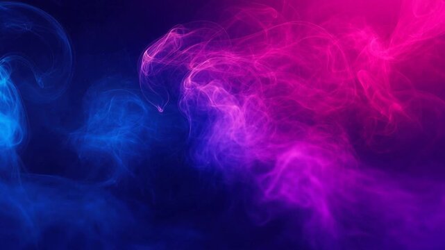 Colorful blue and pink smoke clouds blending in dark background with abstract swirling patterns