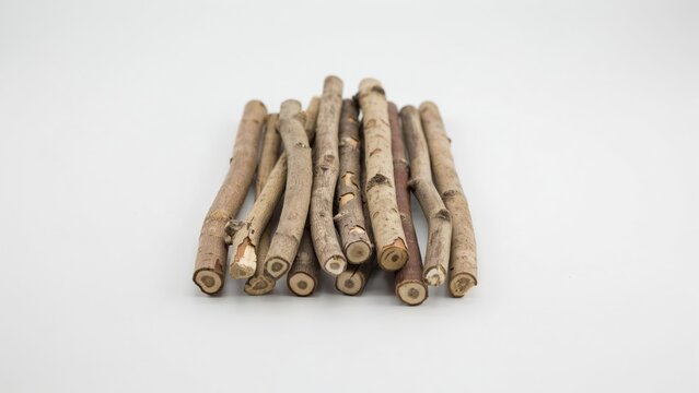A bundle of wooden sticks isolated on white background