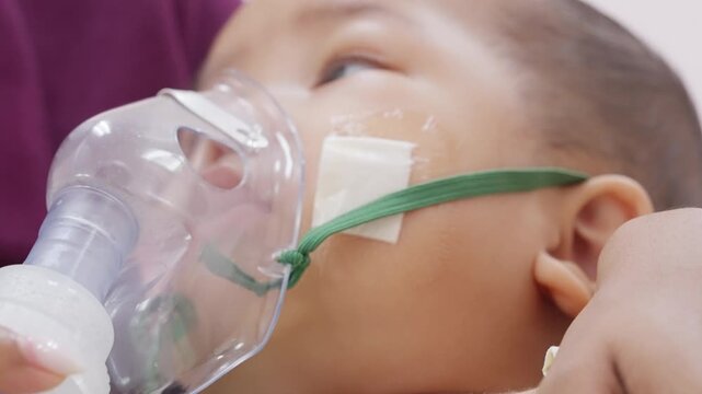 Baby Boy Receiving Respiratory Therapy for Lung Infection in Hospital