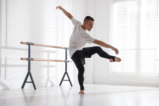 Professional dancer practicing moves in dance studio