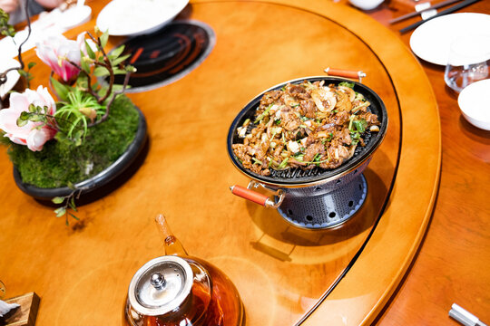 Delicious food served on a table at a restaurant in the evening