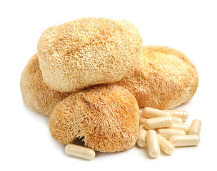 Functional mushrooms and pills isolated on white © New Africa