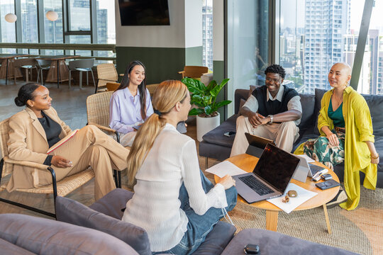 Team Meets for a Project Discussion in a Modern Office Space