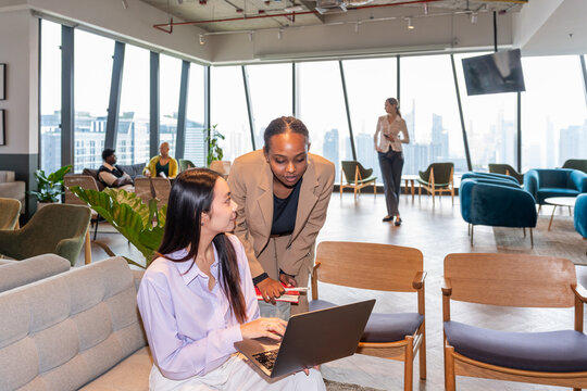 Women Working Together in Modern Office Space During Daytime